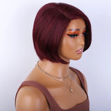 Straight burgundy human hair bob wig with side part, glueless design, worn and styled for a natural look.
