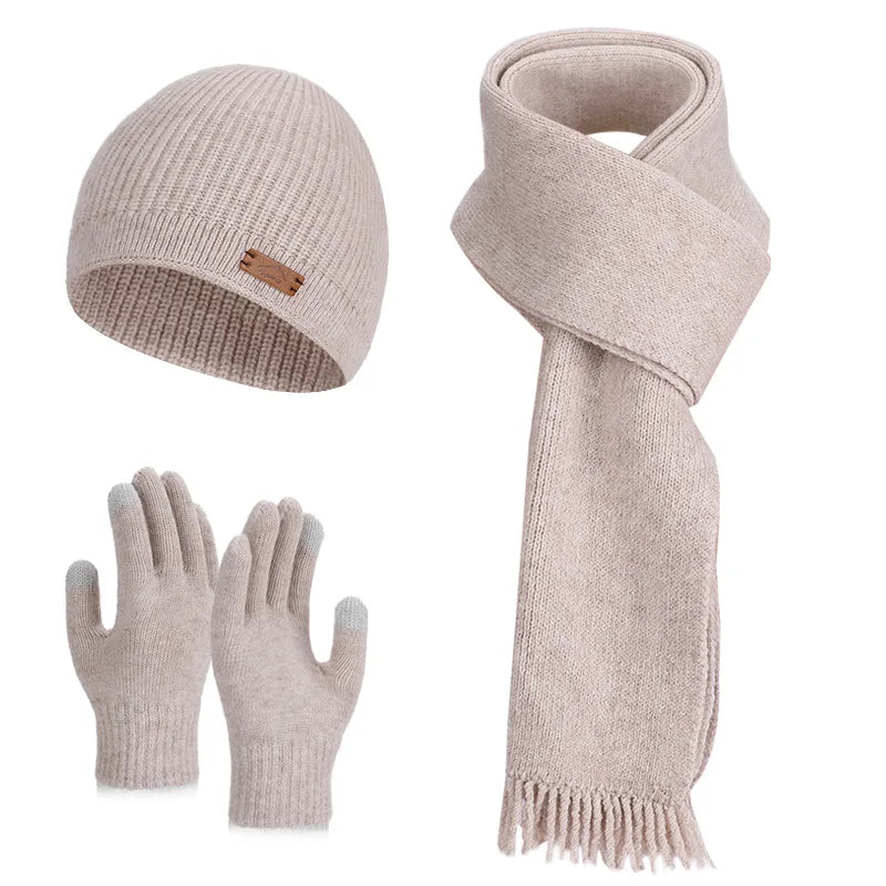 Women's warm woolen hat, scarf and gloves set in a coordinated winter accessory collection