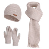 Women's warm woolen hat, scarf and gloves set in a coordinated winter accessory collection