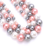 Natural freshwater shell pearls beads for jewelry making, displayed as hair styling accessories