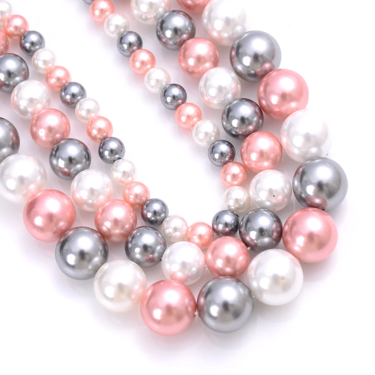 Natural freshwater shell pearls beads for jewelry making, displayed as hair styling accessories