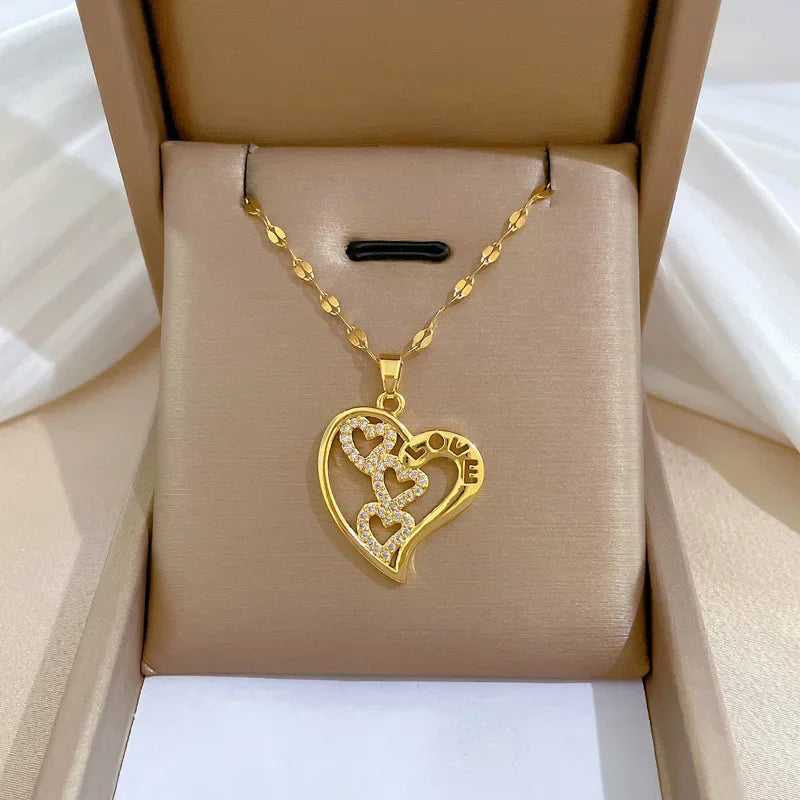 Trendy gold-tone stainless steel heart zirconia necklace for women and girls, perfect for parties and daily jewelry wear.