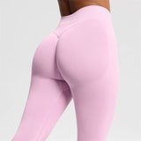 Women's seamless bum-shaping leggings with ribbed waistband and scrunch butt detail for yoga and fitness