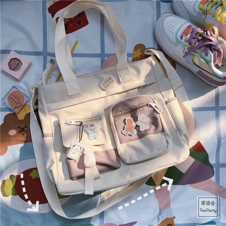 Waterproof canvas women’s handbag featuring a shoulder strap, tote style with nylon accents, suitable as a crossbody or satchel.