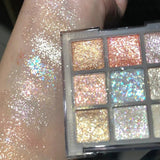 9-color glitter eyeshadow palette with earth tones, pearlescent shimmer, and blue-purple sparkling shades by HSF Marketplace