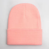 Unisex soft knitted winter beanie in women’s hat style, shown in a solid color with cozy ribbed texture