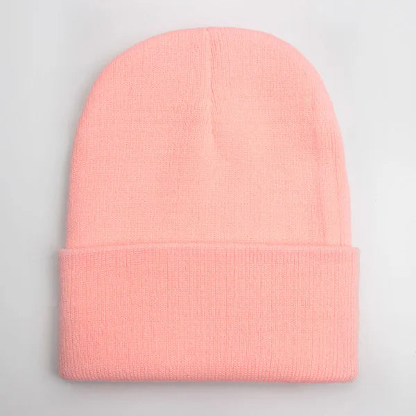Unisex soft knitted winter beanie in women’s hat style, shown in a solid color with cozy ribbed texture