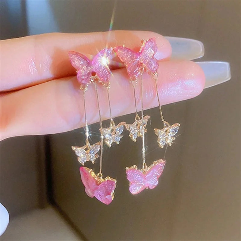 Purple butterfly drop earrings with rhinestone details by HSF Marketplace
