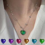 Thermochromic mood monitor heart pendant necklace by HSF Marketplace showing color-changing effect on a silver chain for women and girls.