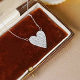 Huitan heart pendant necklace with sparkling CZ stones for women, delicate jewelry design