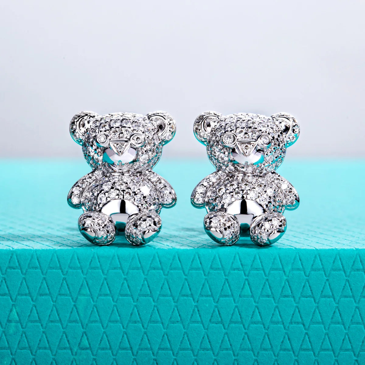 AnuJewel bear stud earrings with D color VVS1 moissanites in 925 sterling silver, close-up jewelry image