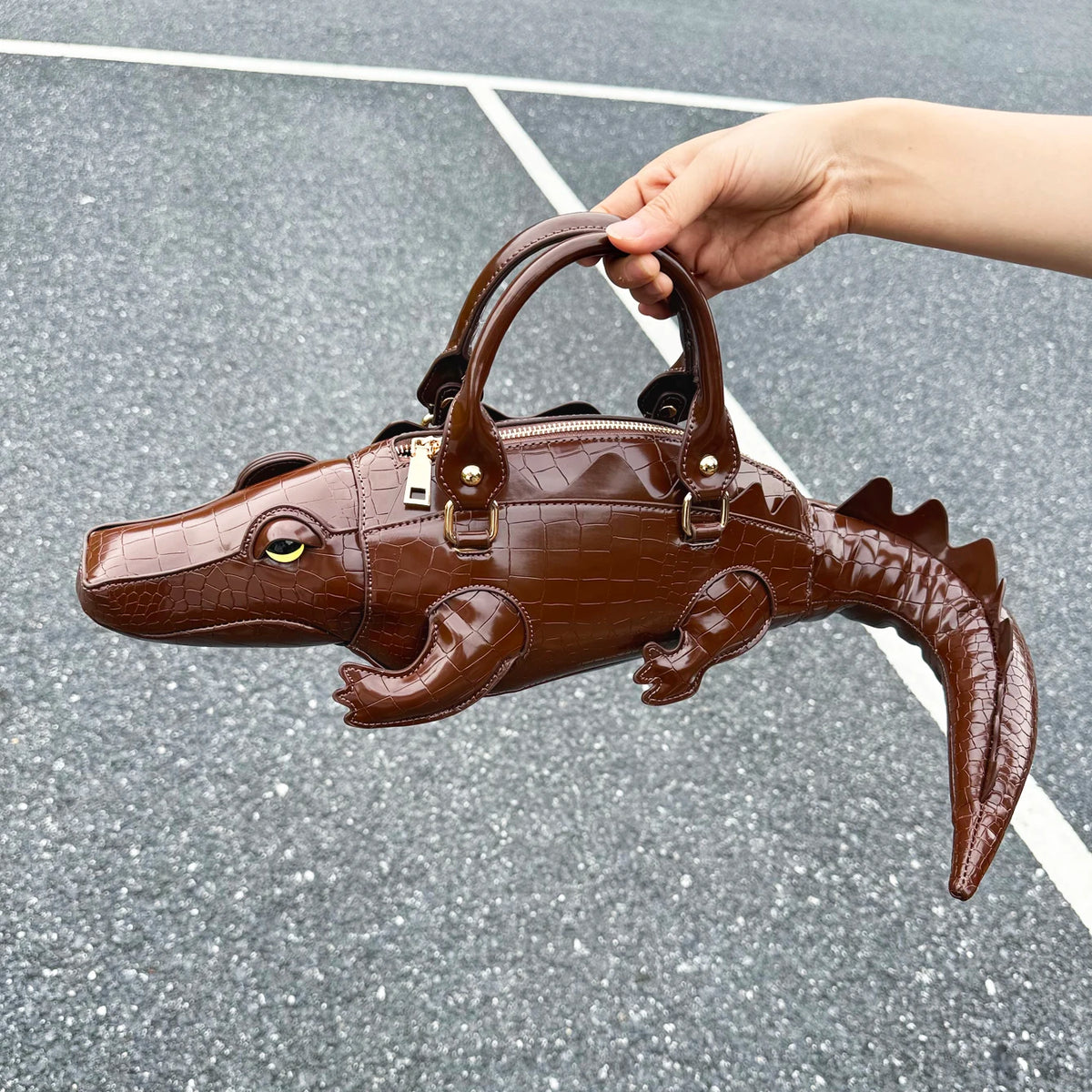 Luxury designer women's handbag by HSF Marketplace, high-quality PU leather purse with a playful shape and shoulder strap.