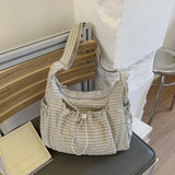 Women checkered nylon sling bag by HSF Marketplace featuring a drawstring crossbody design and large capacity satchel style.