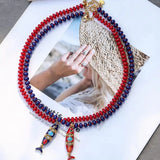 Red and blue beaded necklace with multi-layer fish pendant, natural stone and stainless steel, jewelry by HSF Marketplace