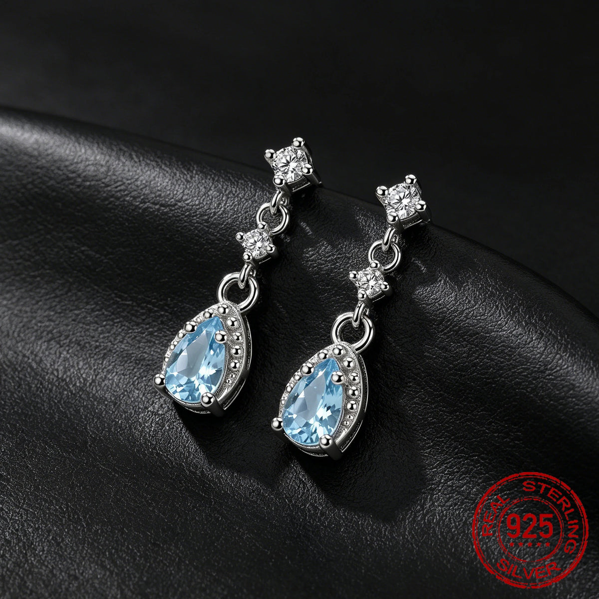 Sterling silver dangle drop earrings with sea blue CZ stones for women by HSF Marketplace