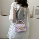 Luxury black PU leather shoulder handbag for women with underarm design, compact and stylish for everyday use.