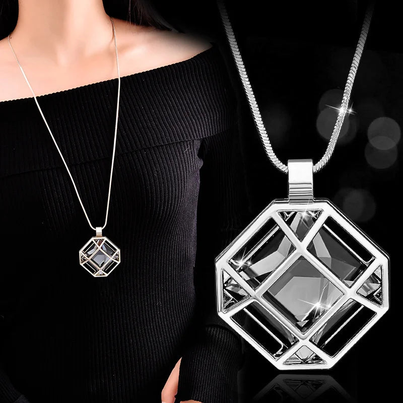 Fashion geometric crystal long necklace with pearl pendant, statement jewelry for women, featuring a modern collar design.