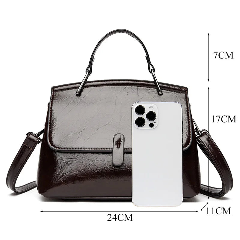 Elegant leather shoulder handbag for women, small messenger crossbody bag with stylish design and high-quality craftsmanship.