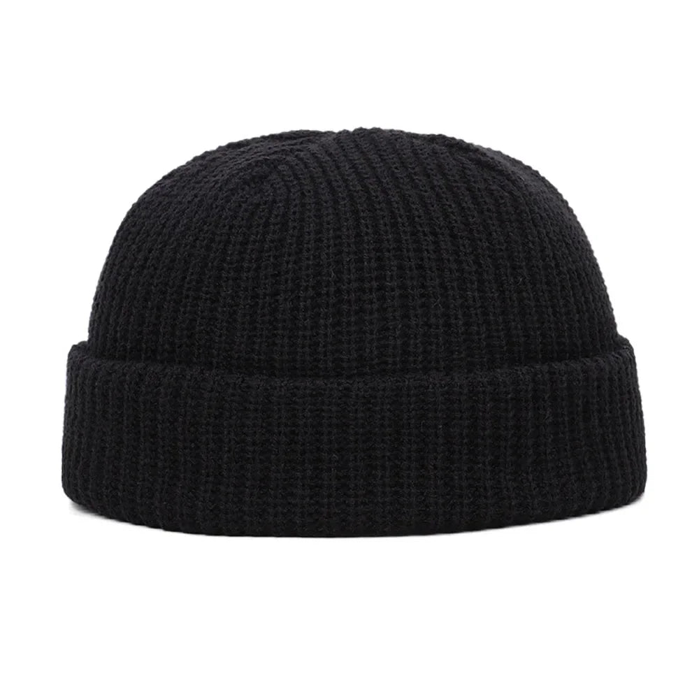 Unisex knitted beanie hat in soft winter fabric, close-up view of the ribbed women's winter hat.