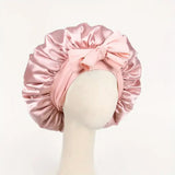 Silk satin hair bonnet with adjustable tie band, ideal for sleeping and protecting hair for women and men.