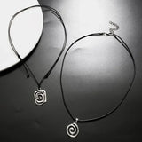 Vintage spiral vortex pendant necklace with hand-woven leather rope, boho goth jewelry for women, Y2K fashion accessory