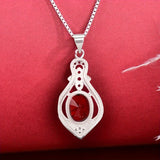 Huitan Fashion red cubic zirconia pendant necklace featuring a graceful, brilliant design for women, perfect for engagement or anniversary jewelry.