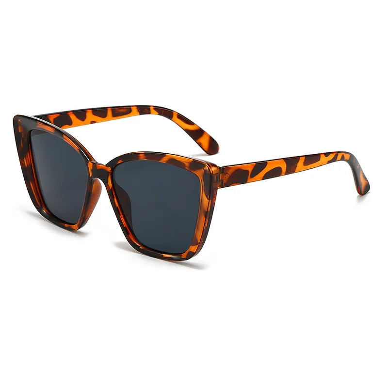 Vintage cat eye sunglasses for women by HSF Marketplace, square small frame retro shades with designer style.