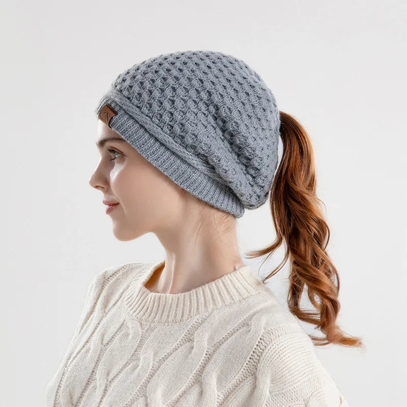 Women's fleece-lined slouchy beanie with ponytail hole and ear flaps, warm winter hat by HSF Marketplace