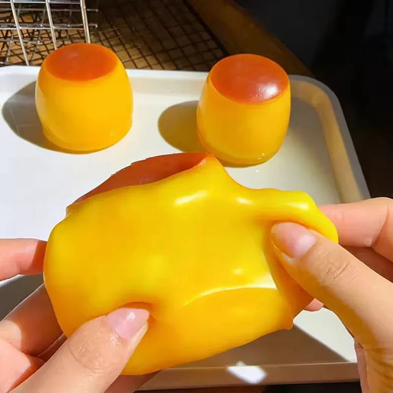 Caramel pudding-themed crunchy squishy fidget toy from HSF Marketplace, soft and squeezable for stress relief and sensory play.