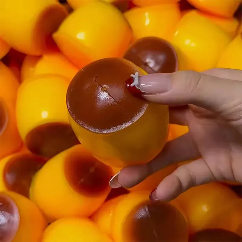 Caramel pudding squishy fidget toy from HSF Marketplace, soft stress relief squeeze ball with crunchy texture for sensory play.