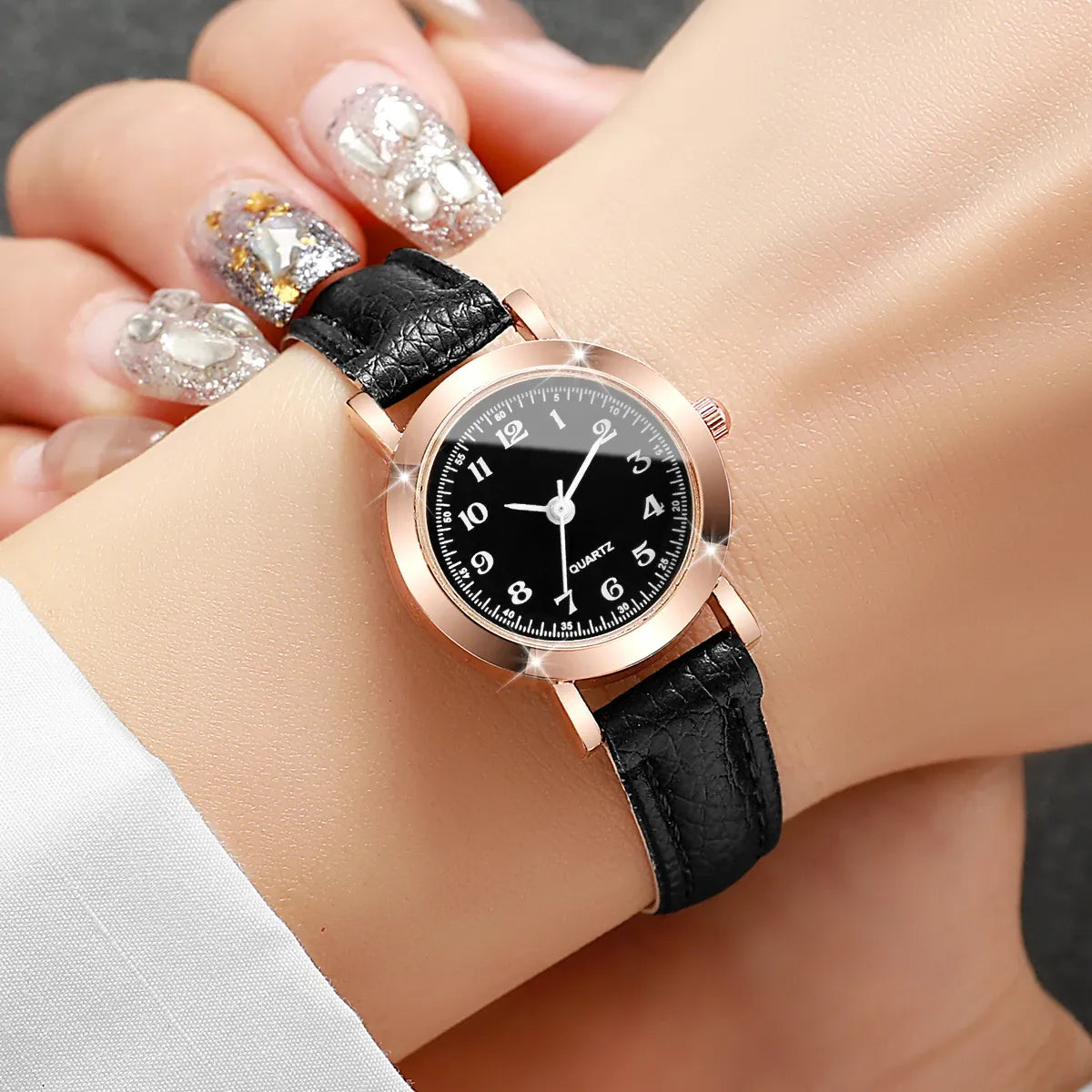 Fashion small dial women's leather band analog quartz wristwatch with a simple, elegant design for girls and ladies.