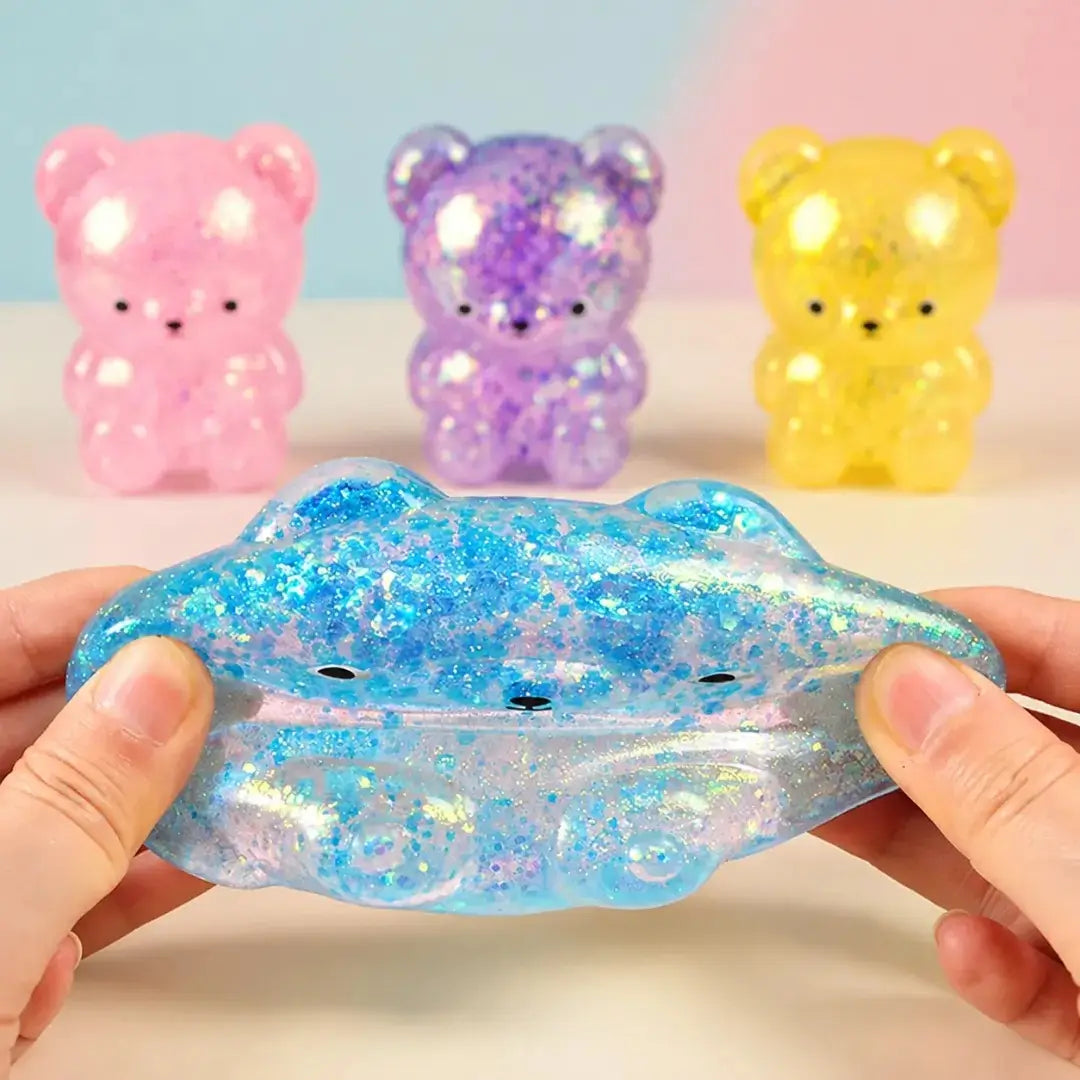 Glitter gummy bear squishy fidget toy from HSF Marketplace, soft sensory stress relief toy for squeezing and fun.