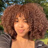 Afro kinky curly Brazilian Remy human hair wig with bangs, short style, glueless wear-and-go design, by HSF Marketplace.
