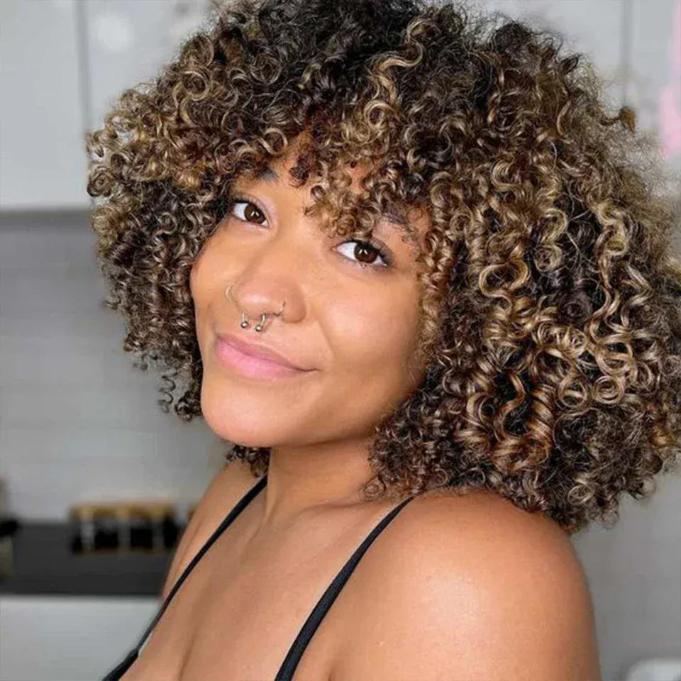 Afro kinky curly Brazilian Remy human hair wig with bangs, short glueless style, natural texture, worn by a model.