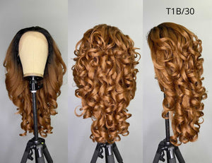 Curly synthetic wig with luxurious auburn tones, featuring a 13x6 lace frontal design for a natural hairline appearance.