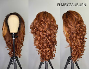 Curly auburn wig with natural-looking lace frontal for seamless styling. Sensationnel What Lace 13x6 Frontal Lace Wig - Latisha showcases voluminous, lustrous waves for versatile, fashionable looks.