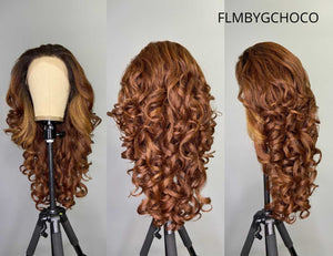 Sensationnel What Lace 13x6 Frontal Lace Wig - Latisha, featuring voluminous, luxurious curls in a warm auburn hue, displayed on a wig stand.