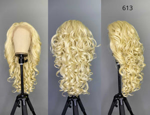Luxurious Curly Blonde Synthetic Lace Front Wig - Sensationnel Latisha Model Showcases Voluminous Cascading Curls for Glamorous Styling Options